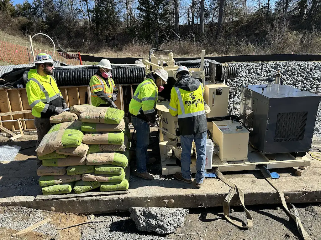 Grout-mixer-training - Pennsylvania Drilling Company Grout mixer specialist training new operators on the PD411 grouting equipment