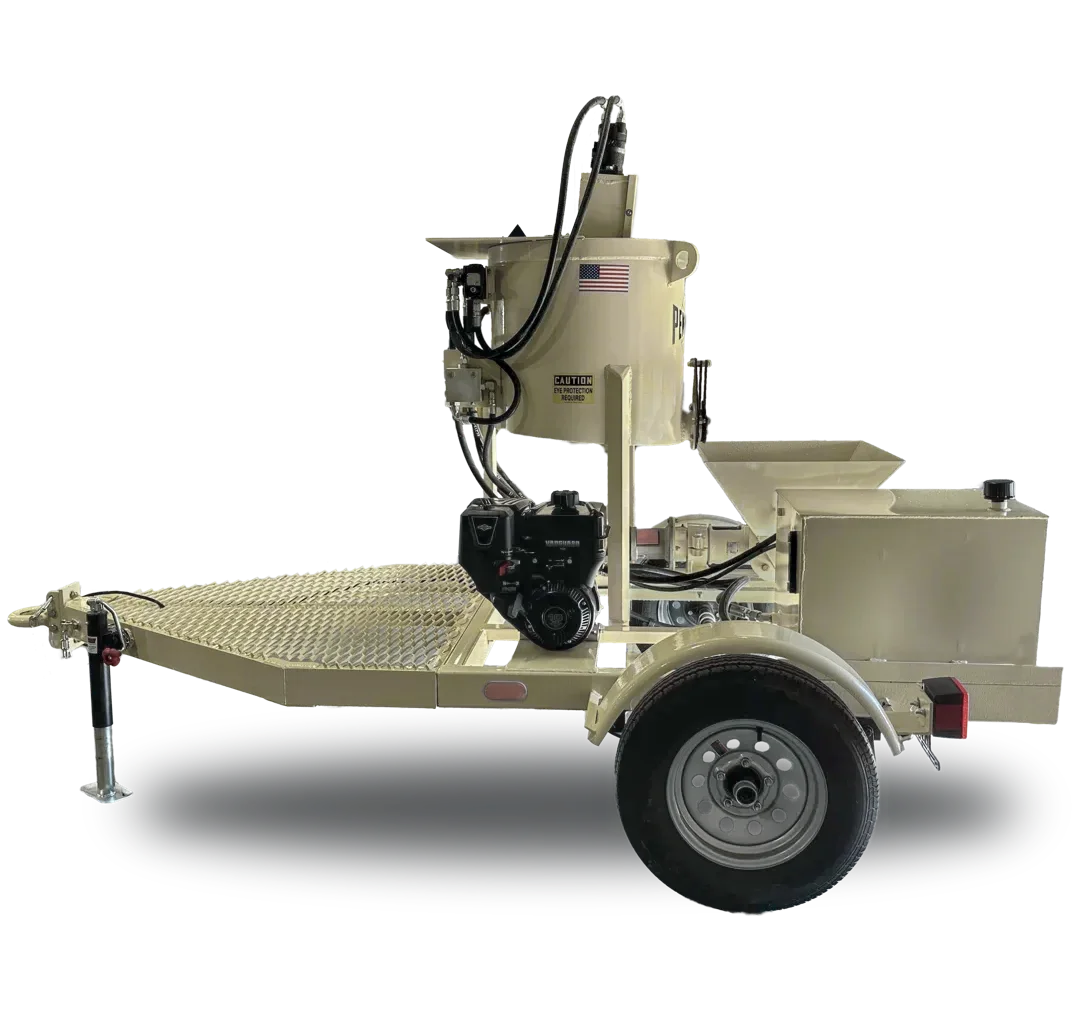 PD50TR-Paddle-Mixer - Pennsylvania Drilling Company a trailer mounted paddle mixer with a small gasoline engine and hydraulic motors.