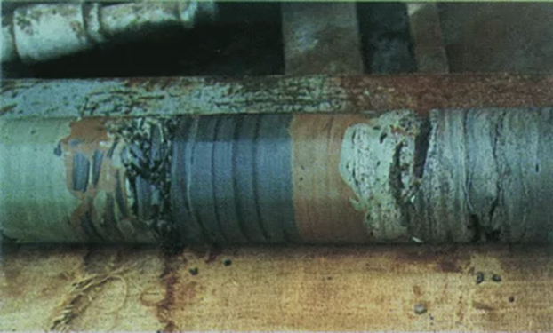 Drill rods on a wood floor